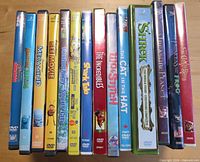 Spines of 13 children’s DVD cases