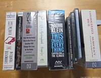 All eight audiobook CD sets standing upright showing spines and shrink-wrap condition