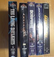 Spines of five sealed James Bond VHS tapes