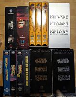 All 15 VHS tapes laid out showing titles and spines