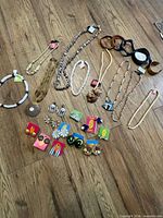 Top-down view of entire jewellery lot laid out on floor