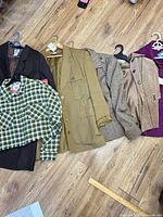 All six blazers laid out side by side