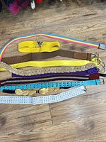 All belts laid out showing colours and styles