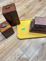 All items grouped: two canisters, four faux books, yellow tray