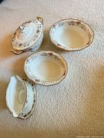 Full set showing tureen, two bowls, gravy boat