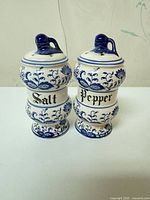 front view of both shakers showing pattern and lettering