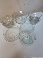 All 12 glass bowls displayed, grouped by size