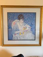 Full view of framed print on wall