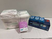 Group shot of all packaged items and storage tub