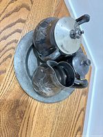 All four pieces grouped on tray