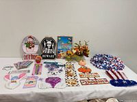 Full overview of assorted seasonal décor items laid out on table