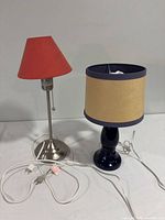 Front view of both lamps showing bases, shades, cords