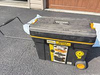 Front view of WorkForce rolling tool chest showing wheels and pull handle
