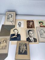 Group view of all nine mounted photos spread out