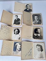 Overview of six open cardstock folders showing mounted black & white portraits and inscriptions