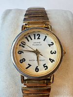 Front view of Anne Klein II wristwatch showing dial, case and part of band