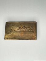 Front view showing stamped name