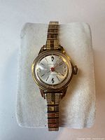 Front view of Caravelle women’s wristwatch on display pad