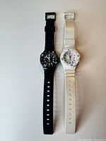Both watches full length, straps extended
