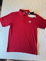 Full view of red 49ers Cutter & Buck polo