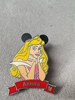 Front view of Aurora pin showing design and colours