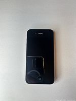 Front view of iPhone 4 showing screen and home button