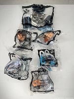All six sealed Happy Meal toy bags laid out