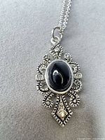 Front view of pendant and chain