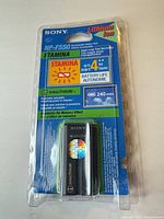 Front view of sealed Sony NP-F550 battery in retail package showing branding and capacity