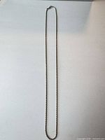 Full view of entire necklace laid flat