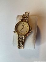 Front angled view showing dial, case and bracelet