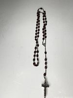 Full view of rosary showing bead decade arrangement and crucifix