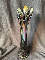 Full view of vase front showing iridescence and ruffled rim