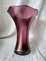 Front view of amethyst iridescent stretch glass vase