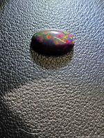 Top view of opal showing multicolour play-of-colour