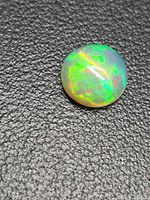 Top view of loose Ethiopian opal showing play-of-color