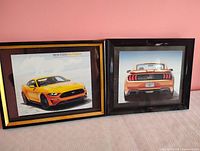 Both framed photographs side by side showing size and condition