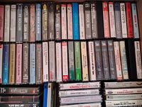 Shelves of cassettes showing spines and title variety