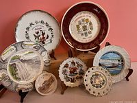 Front view showing all seven souvenir plates