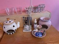 Group shot of all candle holders, oil burners, diffuser and oil