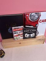 Front view showing all four car books upright