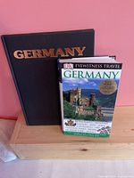 Front covers of both books