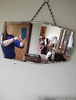 Front view of mirror showing shape and reflective surface