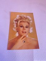Front of color portrait photograph showing Eva Gabor