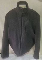 Front view of charcoal Britches zip jacket on mannequin