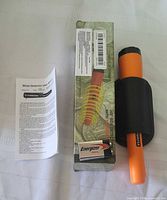 GP-Pointer pinpointer beside box and manual