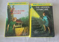 Front covers of both Nancy Drew books side by side