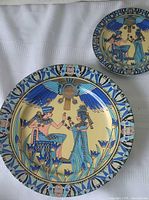Front view of both plates displaying artwork and sizes