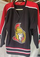 Front view showing Ottawa Senators crest and color scheme