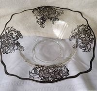 Top view showing full bowl, silver overlay pattern and scalloped rim